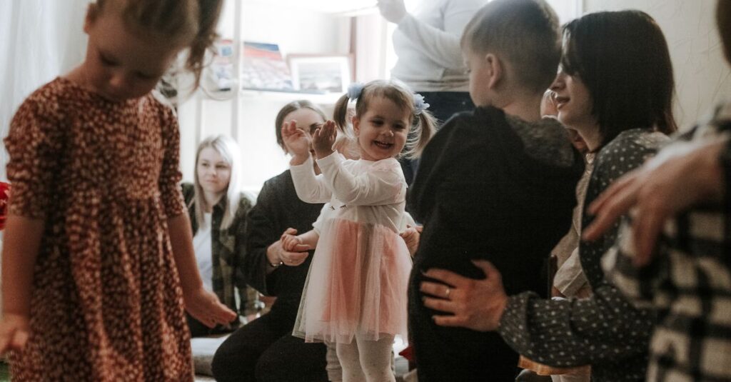 Happy children playing with family and friends during an indoor playdate, full of laughter and joy.