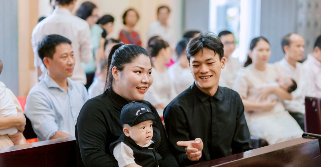 A family enjoys time together in a church setting, filled with warmth and happiness.