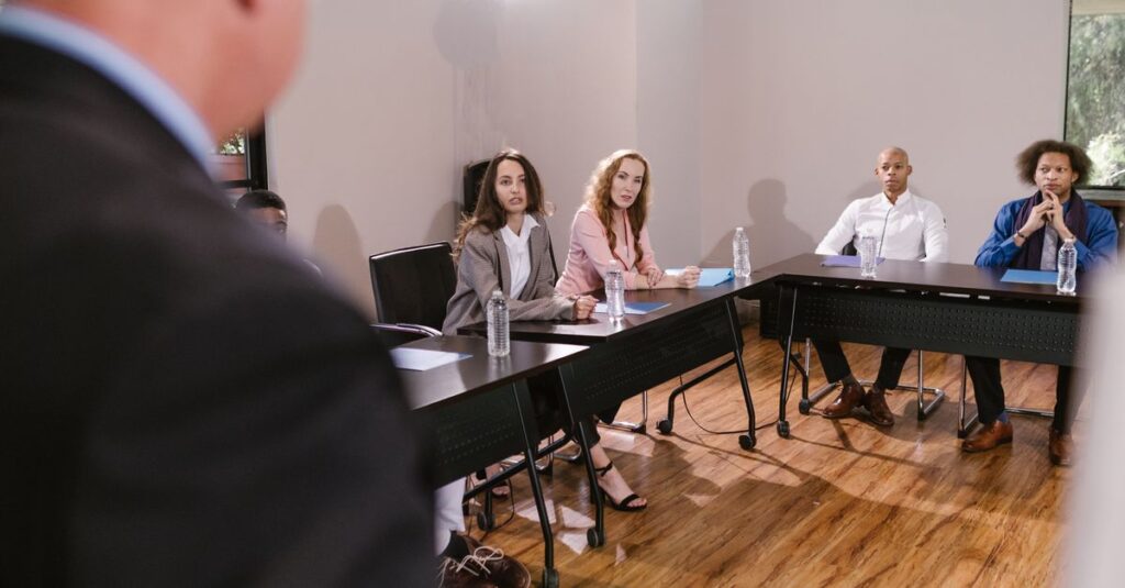 Diverse team in a business meeting discussing strategies in a conference room.