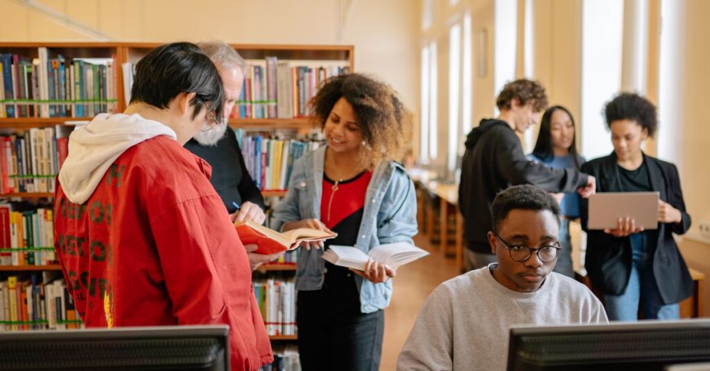 Students collaborating and studying in a library, fostering education and diversity.